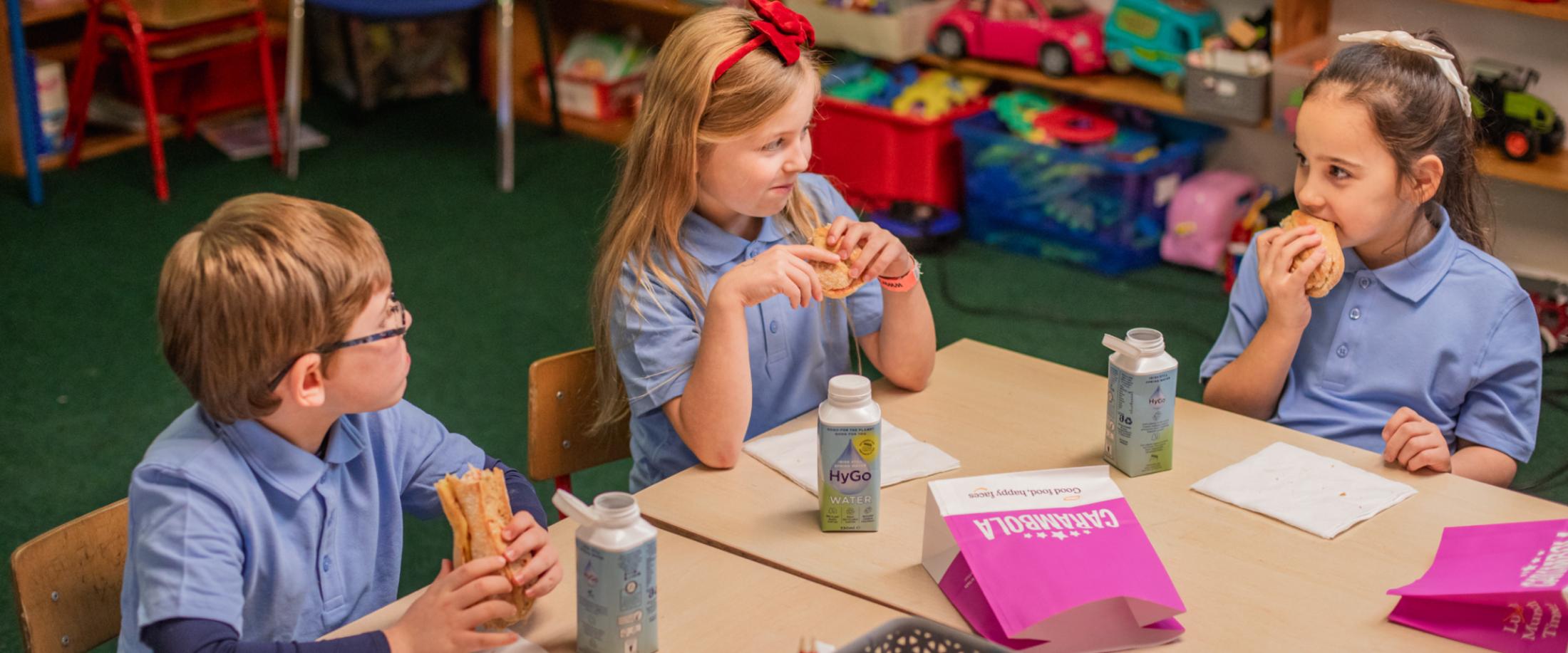 Children eating Carambola lunches