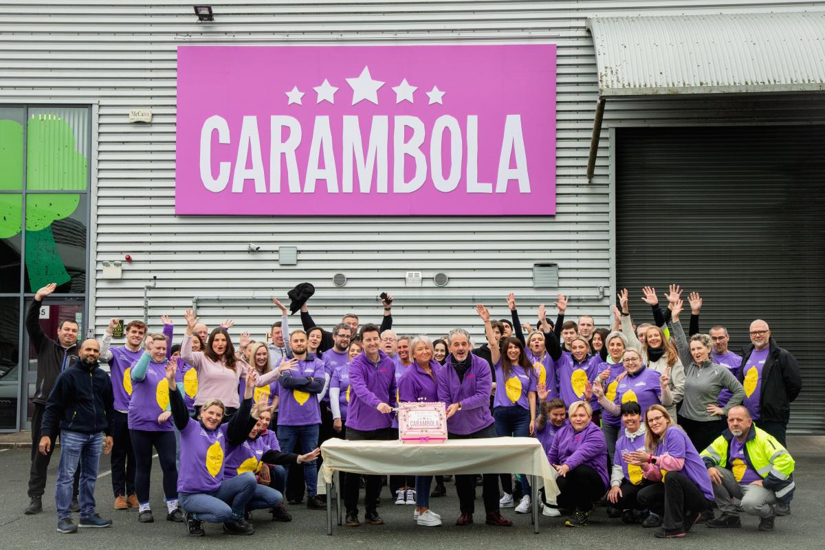 The Carambola team outside HQ