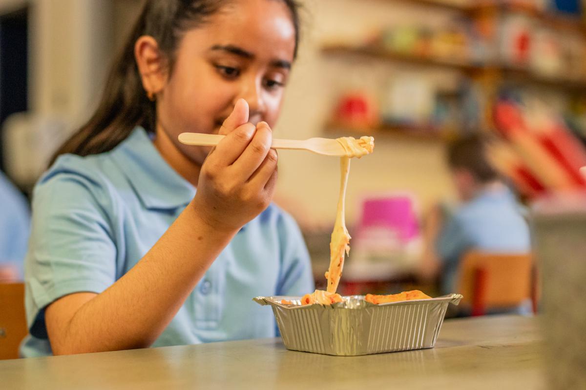 Child eating Carambola lunches